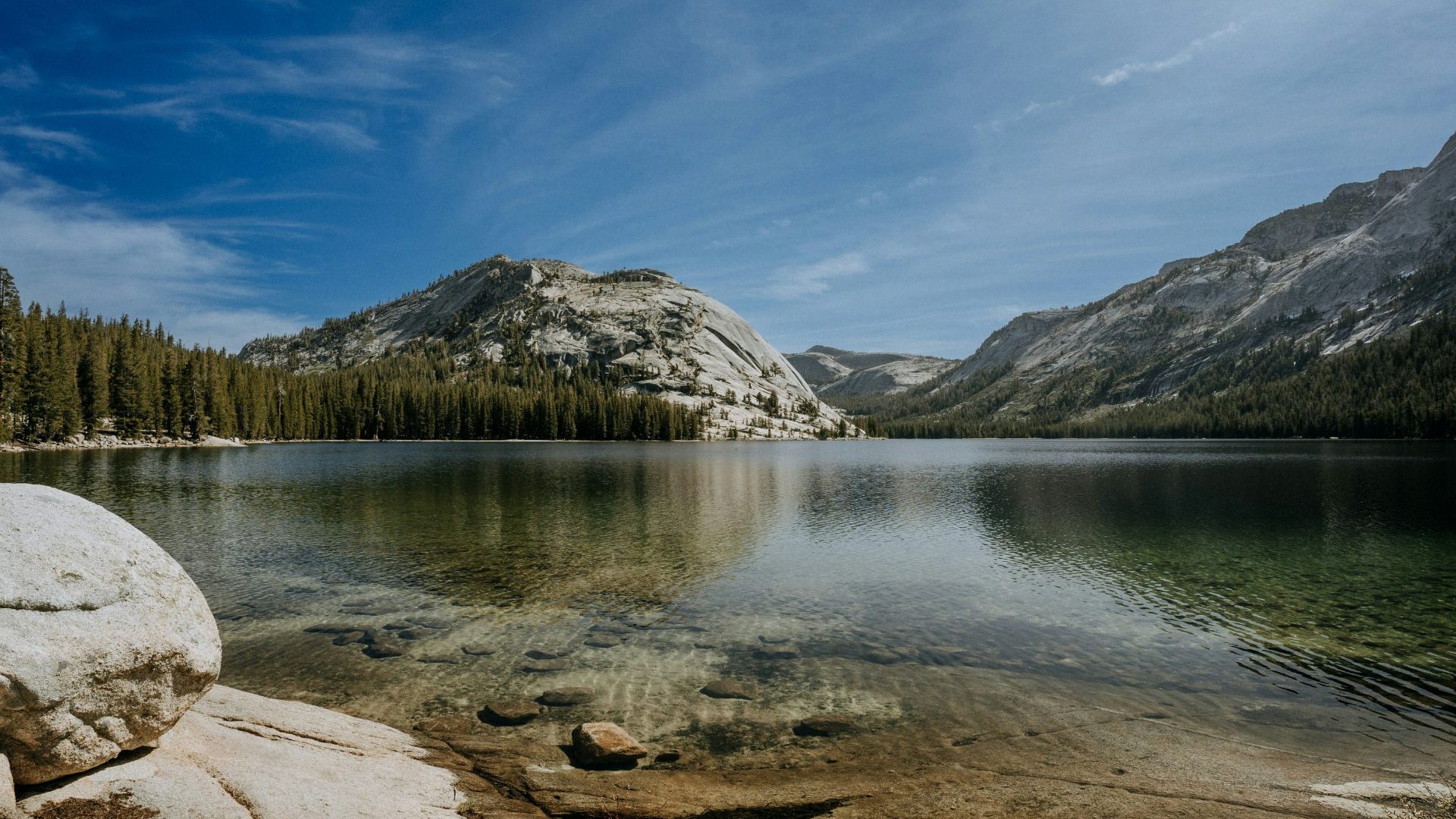 Mountain lake under blue sky