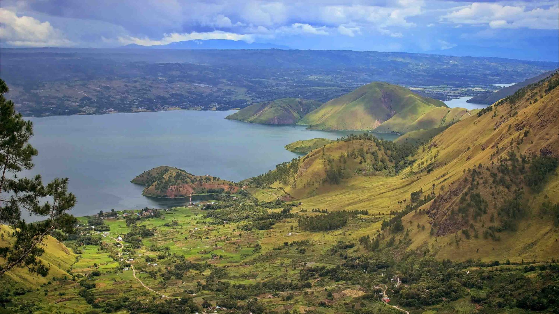 Hills head down to a lake.