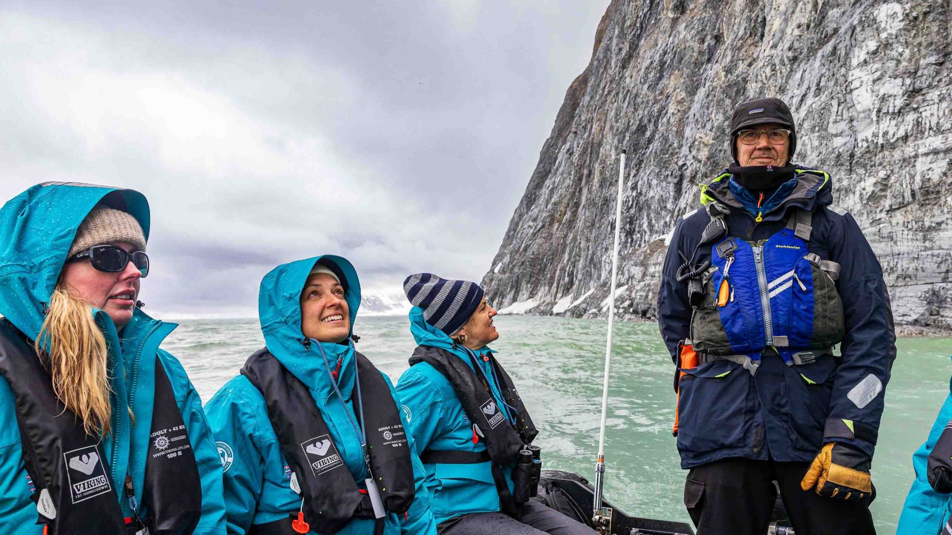 People on board a zodiac boat.