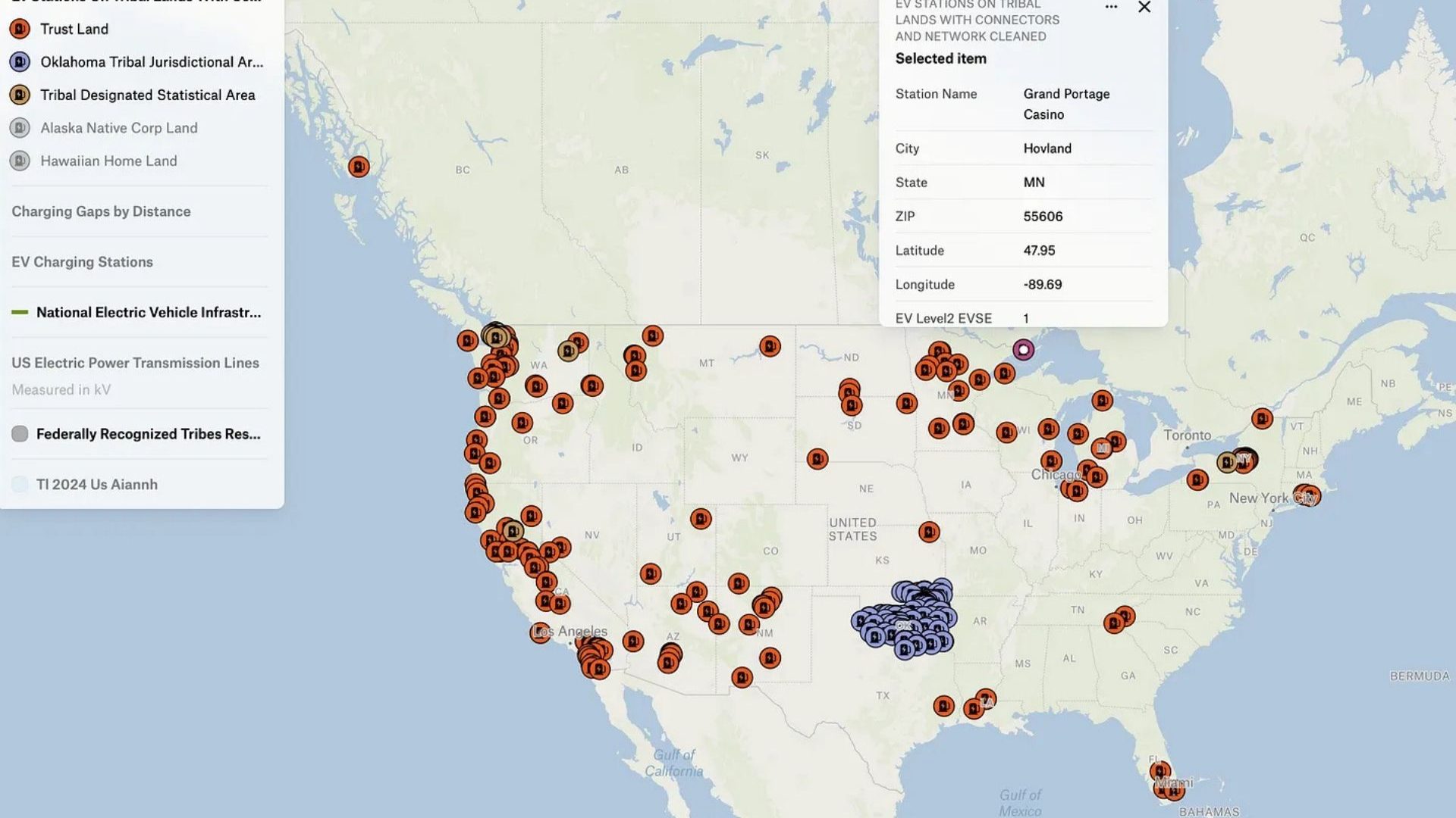 A screenshot of a map of the United States with blue, red, and brown pins showing electric vehicle chargers on tribal land throughout the country.